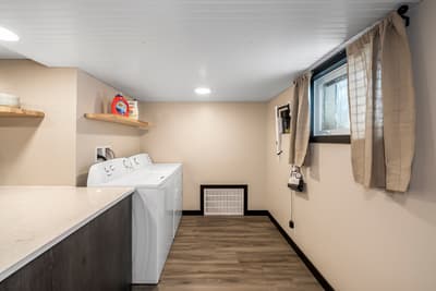 Your dedicated laundry room keeps your vacation wardrobe fresh with full-size washer and dryer, plus convenient storage for supplies.