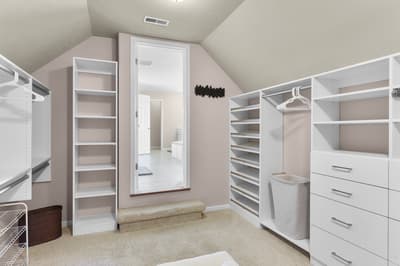 Your spacious walk-in closet offers abundant storage with custom shelving, drawers, and hanging space to keep your belongings perfectly organized.