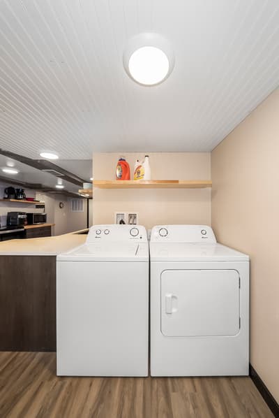 Your own washer and dryer make packing light a breeze, with shelving for detergent and supplies conveniently within reach.