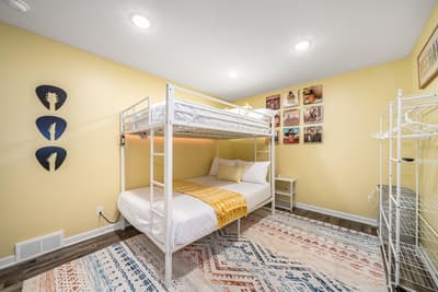 Sleep soundly in your cozy bunk room with crisp linens, warm lighting, and thoughtful touches that make it feel like home.
