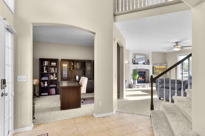 Step into your home away from home, where an inviting office nook and cozy living spaces create the perfect blend of work and relaxation.
