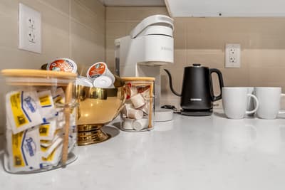 Start your morning right with premium coffee facilities, complete with Keurig maker, electric kettle, and curated selection of beverages.