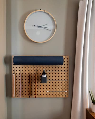 Stay organized with your own stylish pegboard organizer and keep track of time with the modern wall clock.