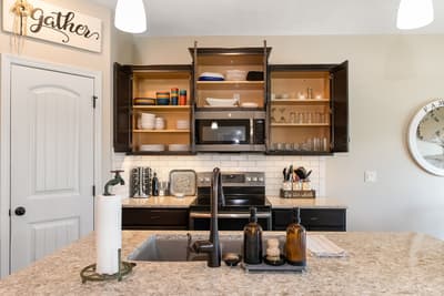 Your fully equipped kitchen invites you to create memorable meals with granite counters, stainless appliances, and thoughtful touches throughout.