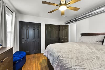 Drift off in your spacious bedroom with warm wood floors, ceiling fan comfort, and generous closet space for all your belongings.