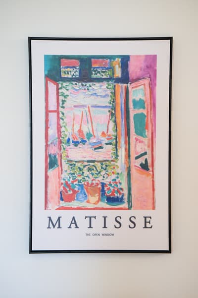 Admire this beautiful Matisse print adorning your wall, bringing vibrant colors and artistic elegance to your space.