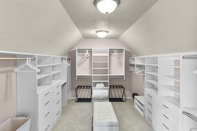 Your spacious walk-in closet offers organized luxury with custom shelving, drawers, and hanging space for all your vacation wardrobe.