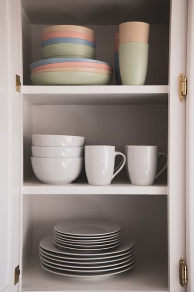 Your well-stocked kitchen cabinet holds everything you need for home-cooked meals and morning coffee.