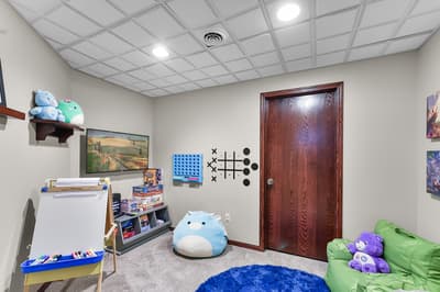 Your little ones will love this dedicated play space with cozy bean bags, games, and toys for endless entertainment.