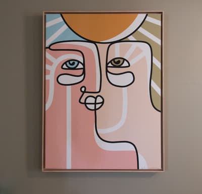 Modern abstract artwork adds personality to your space with warm colors and contemporary design.