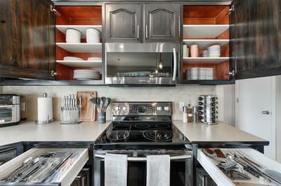 Your fully equipped kitchen awaits with modern appliances and ample storage for preparing memorable meals during your stay.