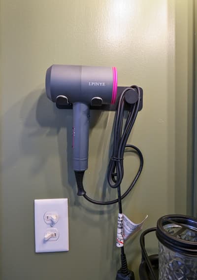 Your convenient hair dryer is mounted and ready for your morning routine or evening refresh.