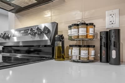 Your fully equipped kitchen awaits with premium appliances and a thoughtfully curated spice collection, ready for culinary adventures.