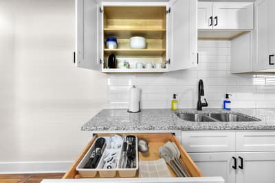 Your fully equipped kitchen features organized cabinets and drawers, making meal prep effortless during your stay.