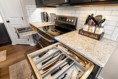 Your gourmet kitchen features granite counters, stainless appliances, and thoughtfully organized drawers to make cooking effortless and enjoyable.
