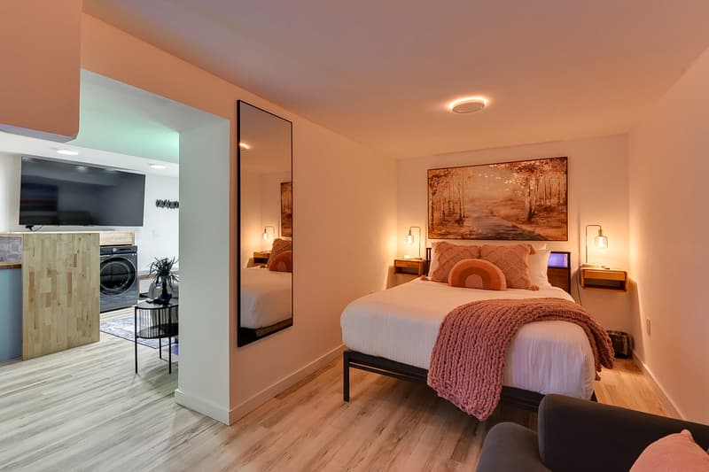 Unwind in your cozy bedroom with warm lighting, plush bedding, and thoughtful touches that make you feel instantly at home.